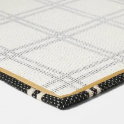 1'6"x2'6" Indoor/Outdoor Plaid Scatter Halloween Doormat Black/White - Hyde & EEK! Boutique™ -Halloween Home Decor Store GUEST 61fba789 c646 4b6a 8307 45e32a6f8042